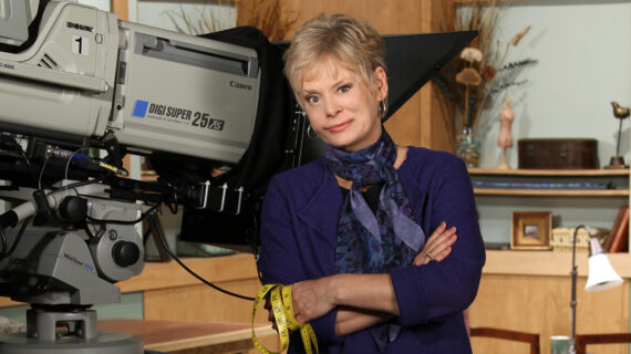 Woman smiling at camera.
