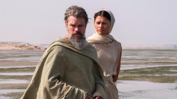 Your guide to The Odyssey: Watch, learn and explore with PBS Wisconsin A man and woman in ancient Greek clothing stand next to each other.
